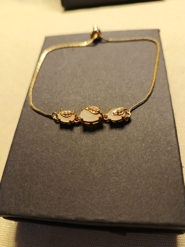 Adjustable Lustre Charm Bracelet