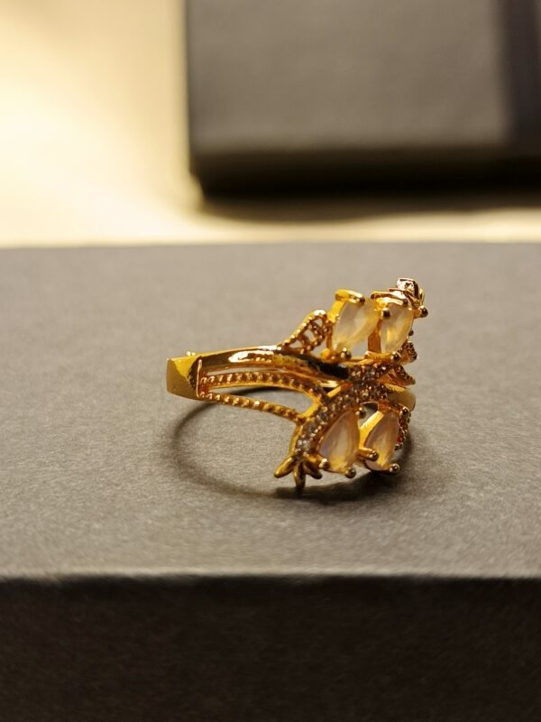 Gold-Plated Floral Ring with White Gemstones - Image 2